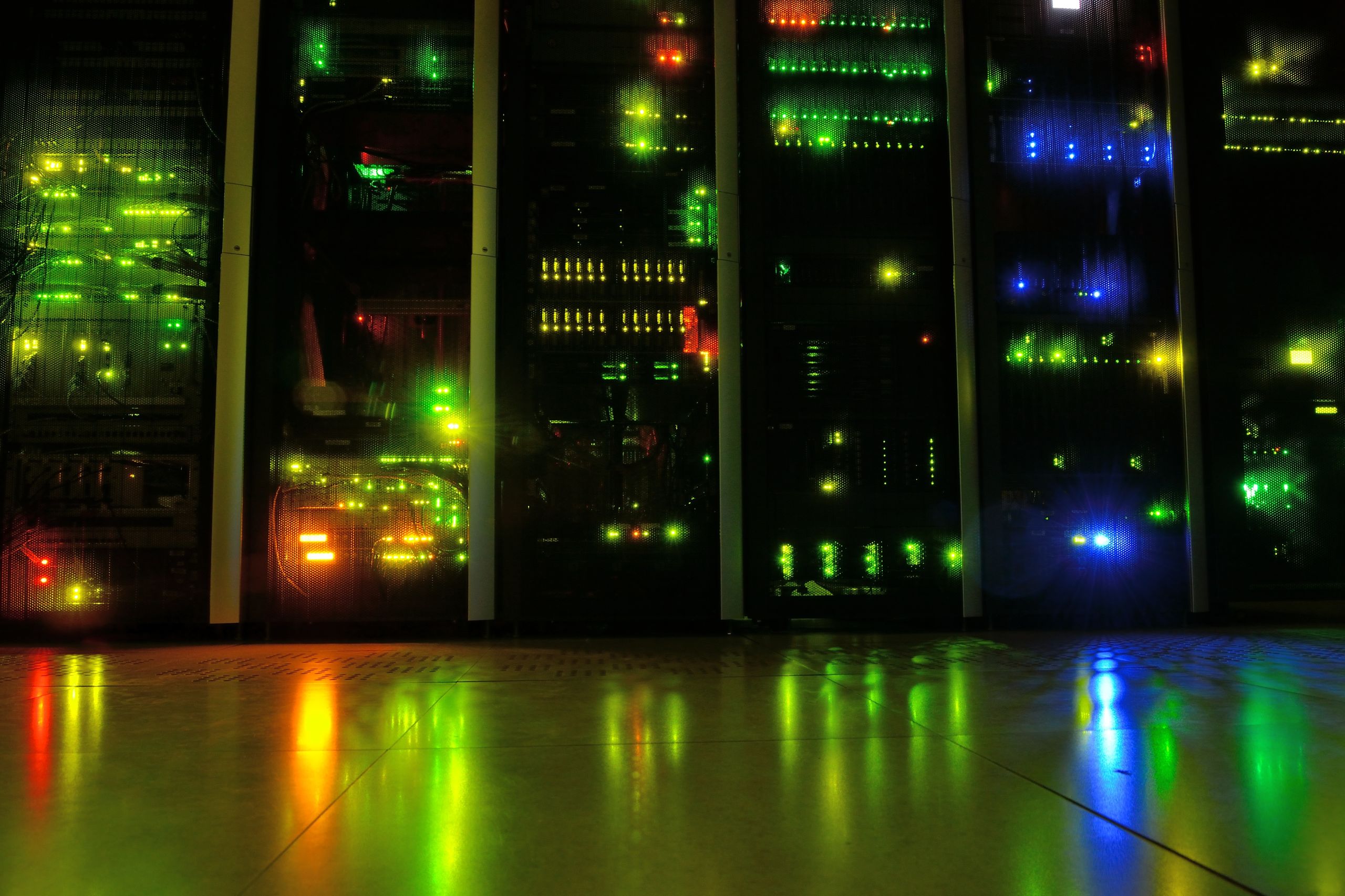 Server room with blue LED lighting representing cloud infrastructure